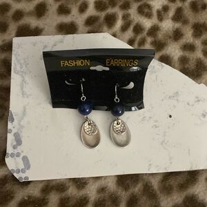 Blue and silver drop earrings.